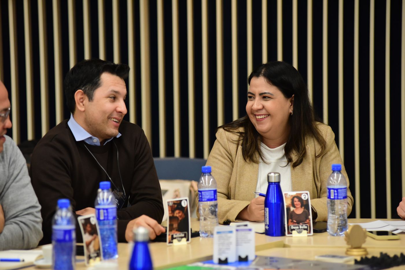 Participantes discutindo o próximo passo do plano de ação